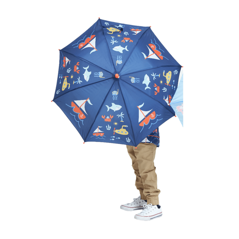 Penny Scallan umbrella for kids in blue with nautical ships and sea-life prints.