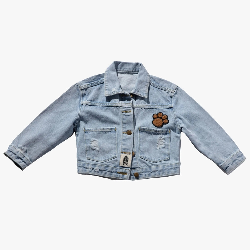 Petite Hailey Bear Patched Denim Jacket in light blue denim; front view shows bear patch, distressed pockets, and brass buttons.