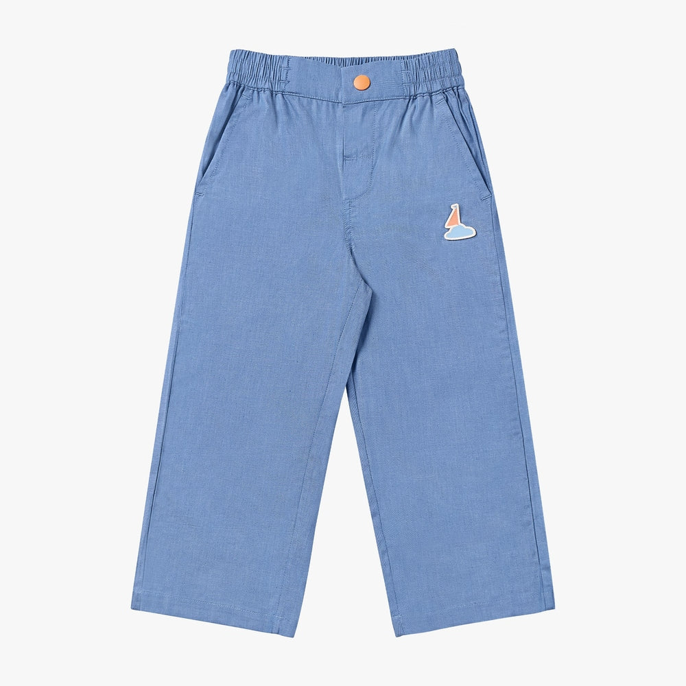 Petite Revery Denim Jeans Sky toddler pants in blue denim with elastic waist and sailboat patch