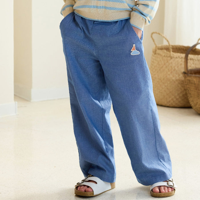 Petite Revery sky blue denim pants for toddlers with relaxed fit and small logo patch
