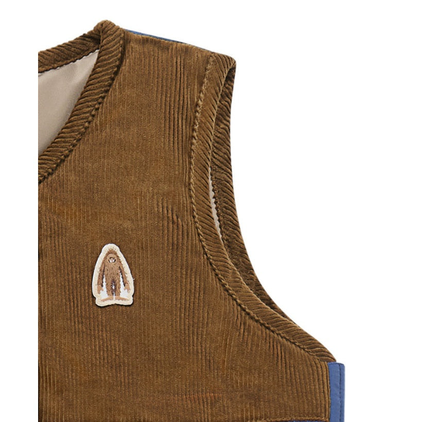 Petite Revery down vest in brown corduroy with visible logo patch