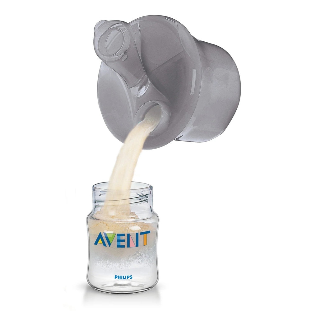 Philips Avent powder formula dispenser and snack cup pouring powder into a bottle