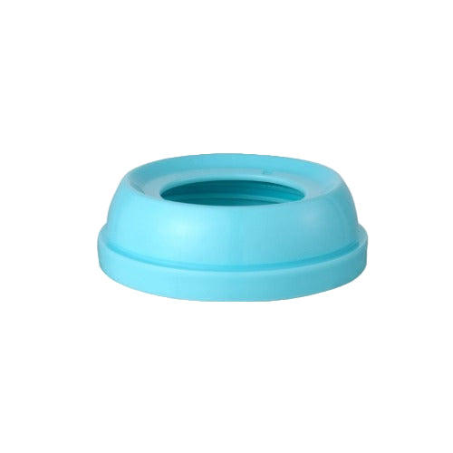Pigeon Baby Bottle Cap, blue, resting as it seals a bottle with its circular seal ring.