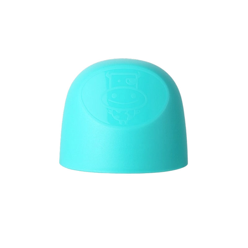 Pigeon Baby Bottle Hood in turquoise, dome cap with embossed logo, ready to seal a bottle.