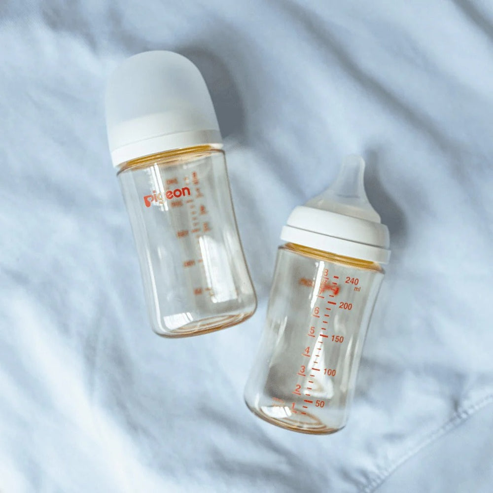 Pigeon PPSU Bottle 8oz with M Nipple: two clear baby bottles with orange markings and white caps.