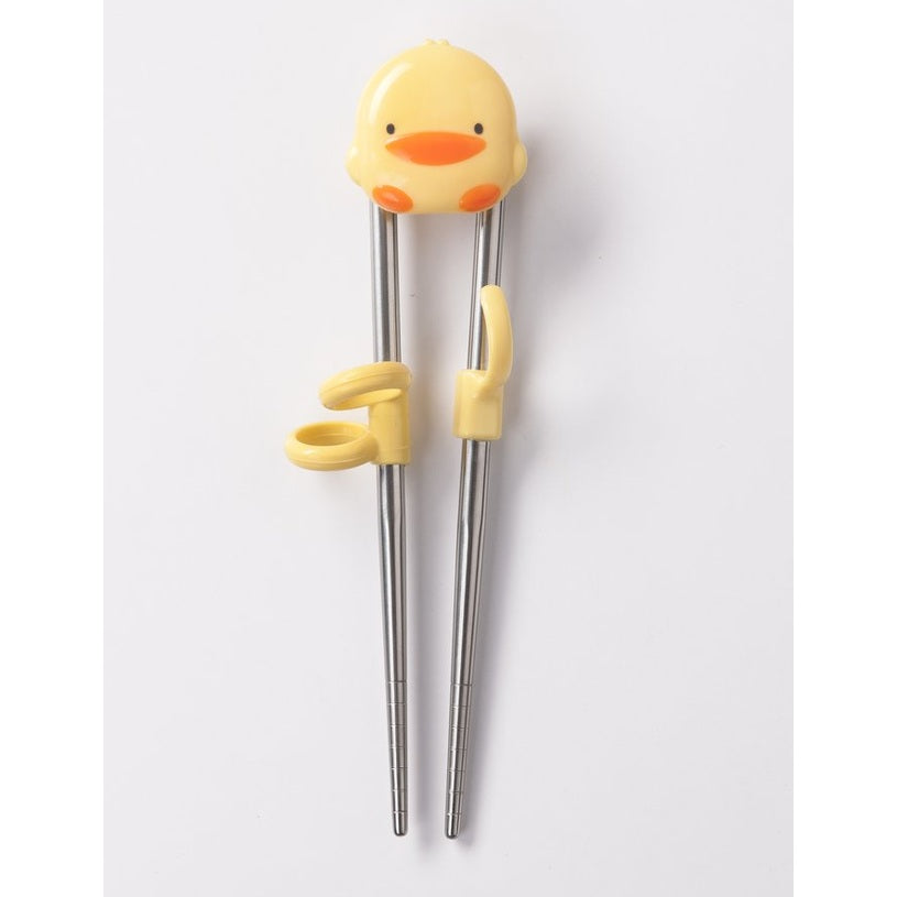 Piyo Piyo Stainless Steel Training Chopsticks with yellow duck head topper; plastic ring grips guide tiny hands.