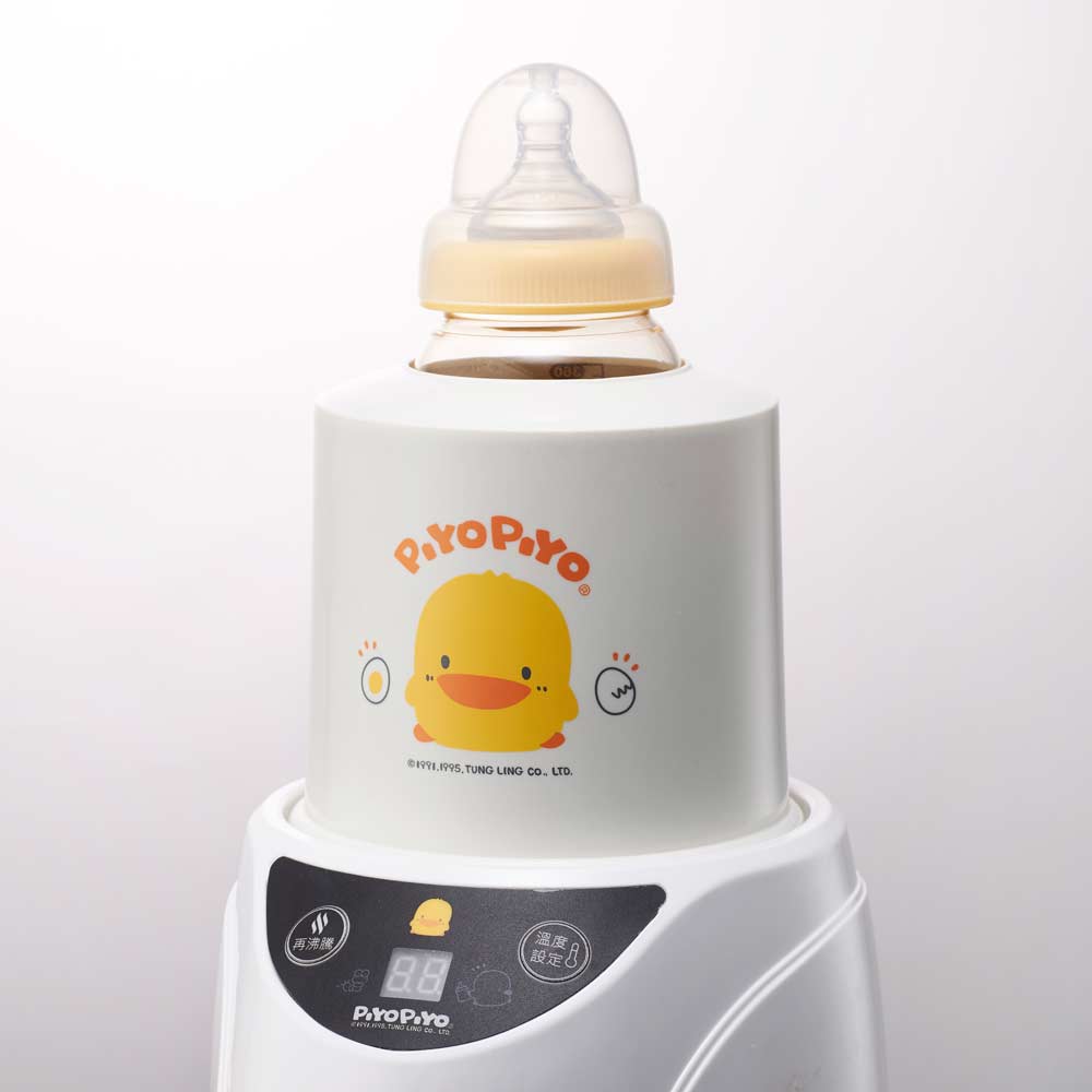 Piyopiyo milk and food warmer with yellow duck logo and digital control panel