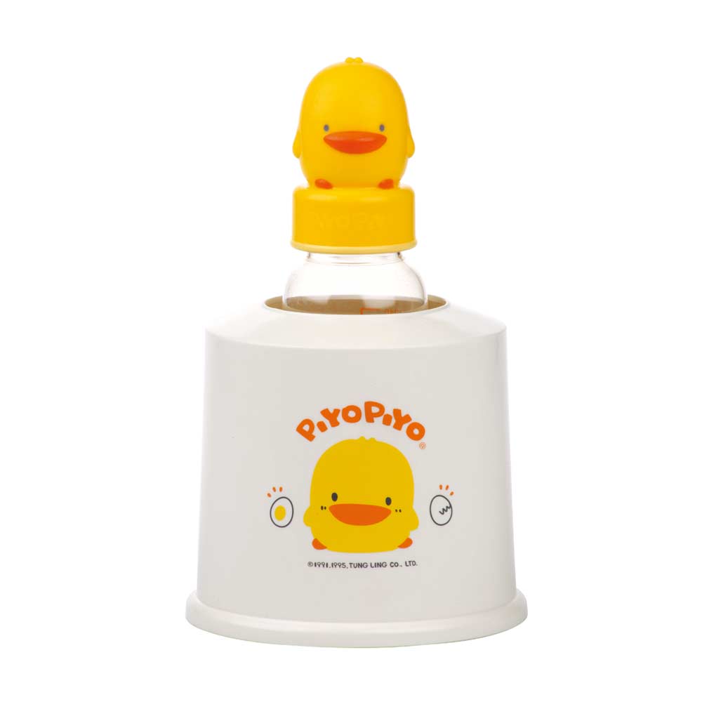 Piyopiyo milk and food warmer with yellow duck lid on white base by PIYO PIYO