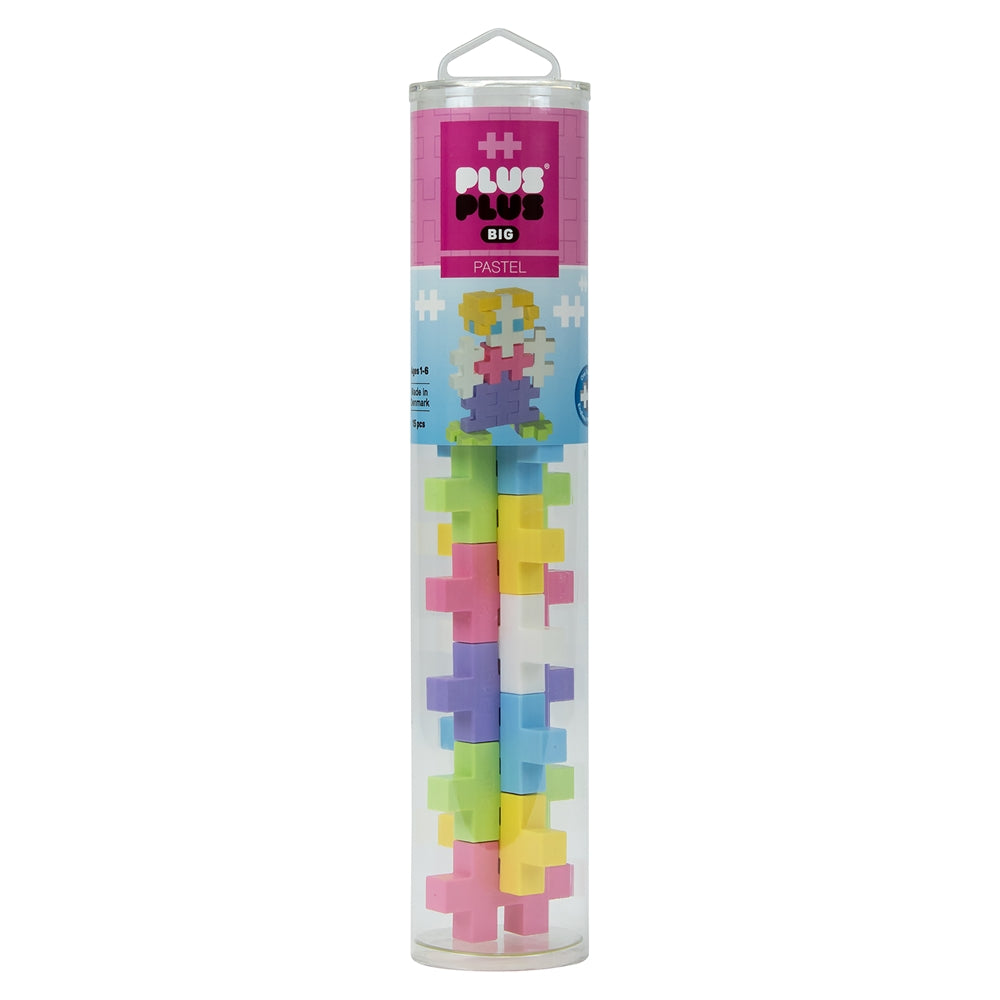 Plus-Plus Tube Big 15pcs Pastel building blocks; pastel cubes stack as a pixel figure sits on top in the tube.