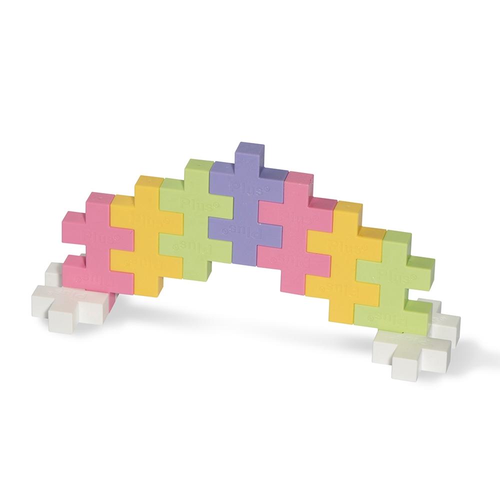 Plus-Plus Tube Big 15pcs Pastel building blocks form a pastel arch showing interlocking design.