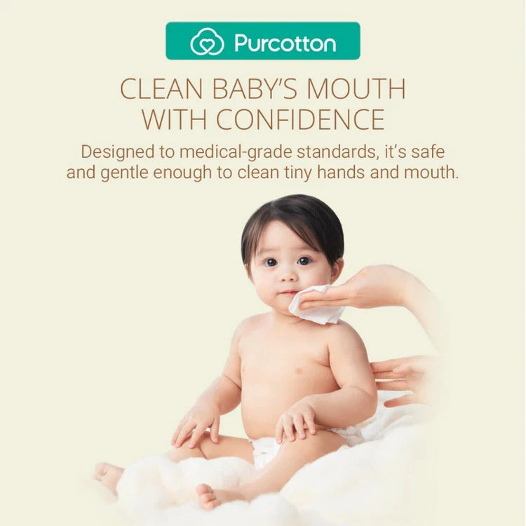 Purcotton Cotton Baby Wet Wipes 80 Sheets; parent gently wipes baby's mouth with soft, medical-grade wipes.