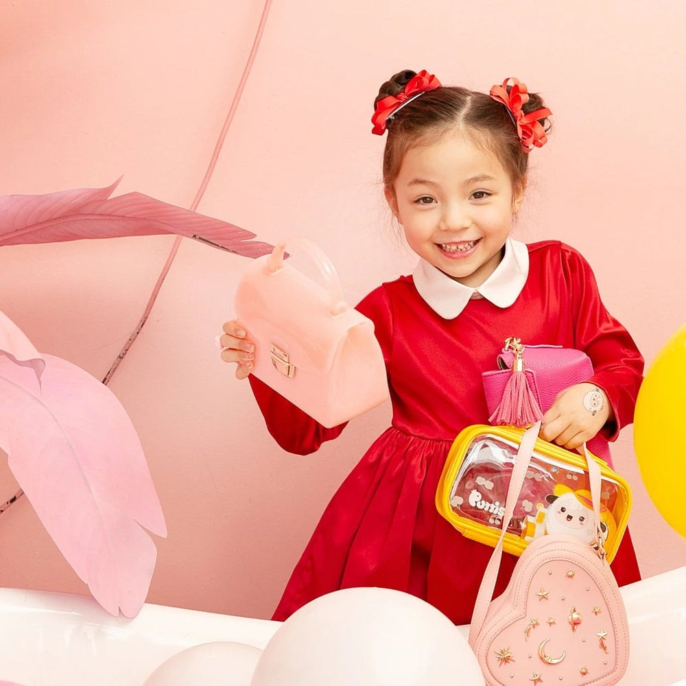 Puttisu Charming Bag pink mini backpack with starry embellishments and gold accents