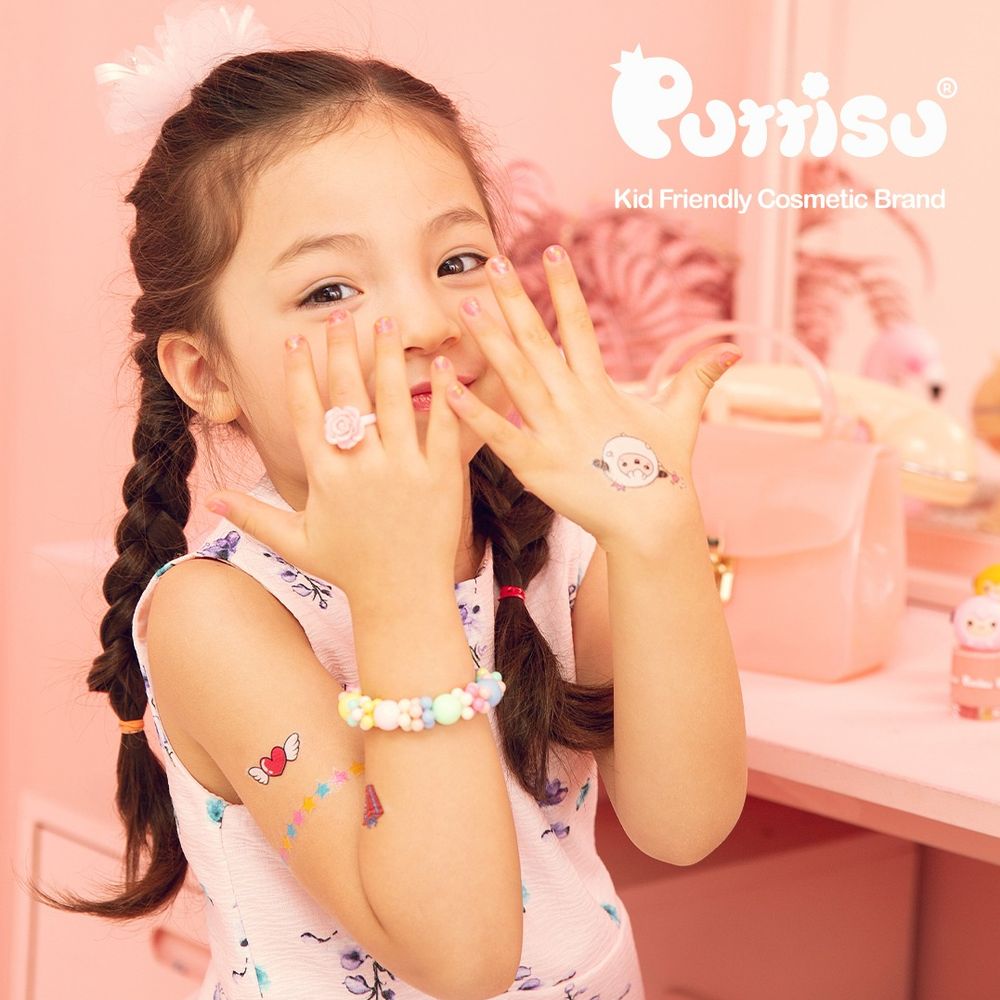 Puttisu TS03 Lovely Balloon Cloud temporary tattoo stickers on a child's hand and forearm in pink pastel setting