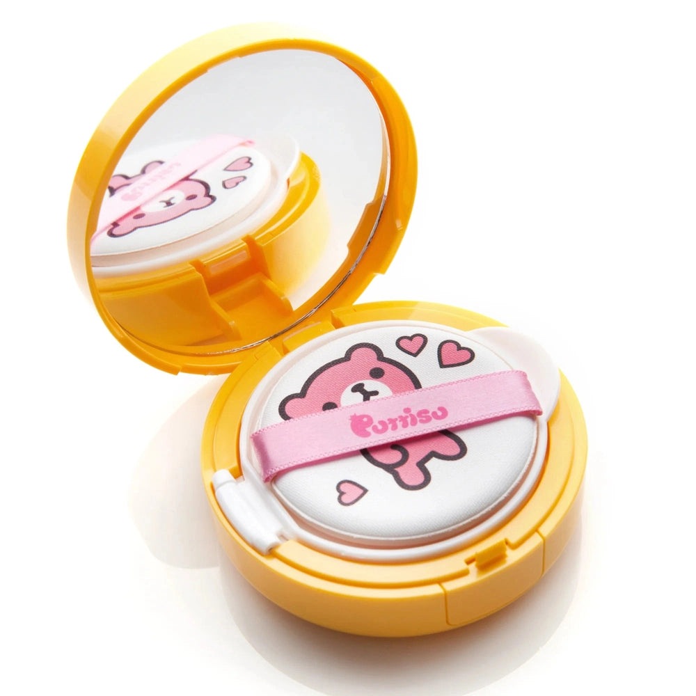 PUTTISU Safe Baby Mild Sun Cushion SPF50+ Pa++++ yellow compact; open lid shows pink bear cushion and applicator strap.