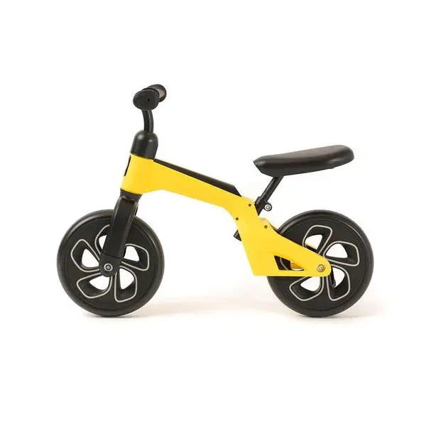 Qplay Balance Bike: yellow frame and chunky black wheels, toddlers push off to learn balance.