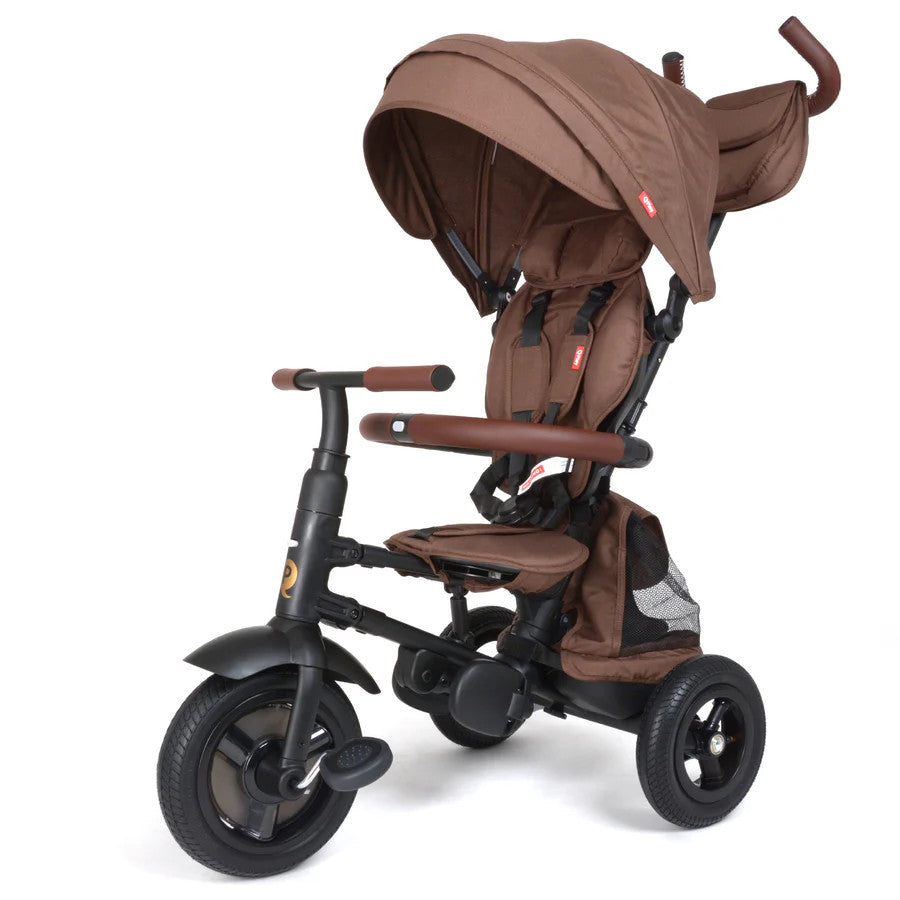 Qplay Rito Plus Folding Trike with brown canopy and seat; three-wheel ride-on shown ready to ride with canopy extended.