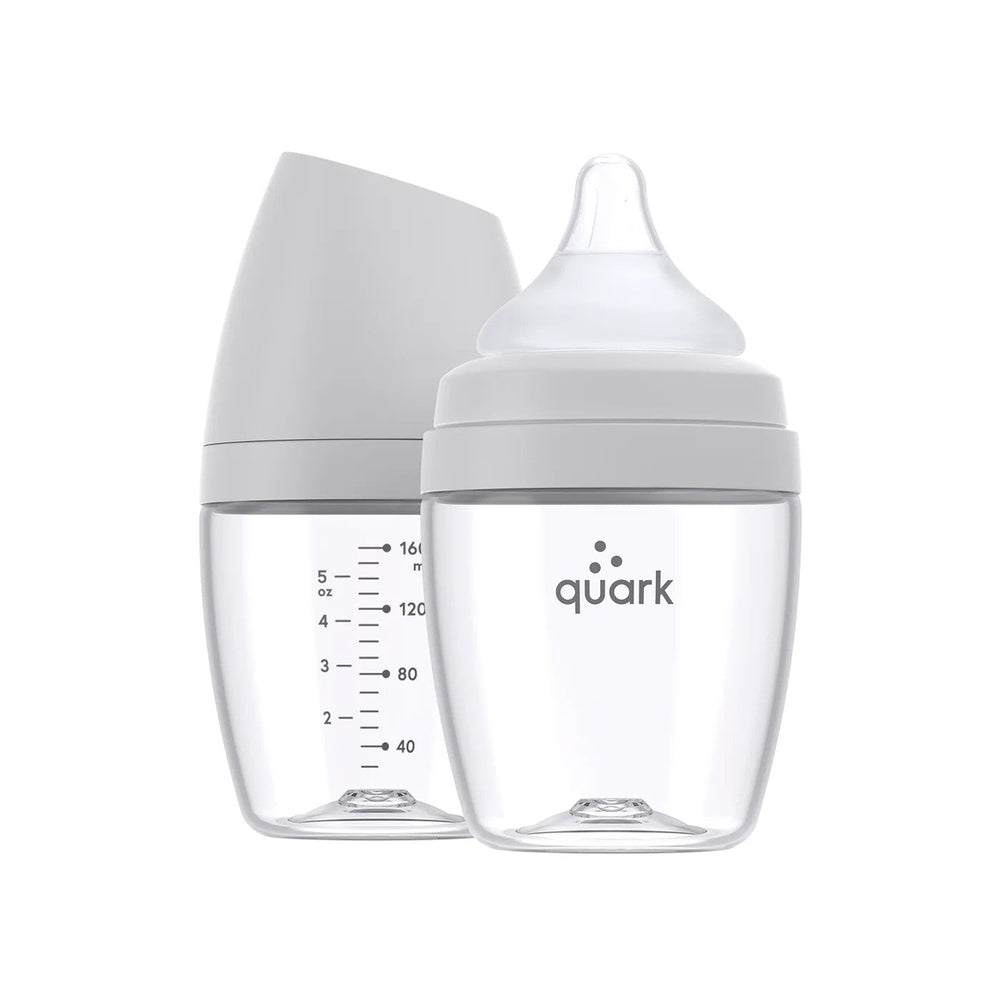 Quark Buubibottle Mini Hybrid Feeding Bottle in clear plastic with gray cap, silicone nipple, and visible measurement marks