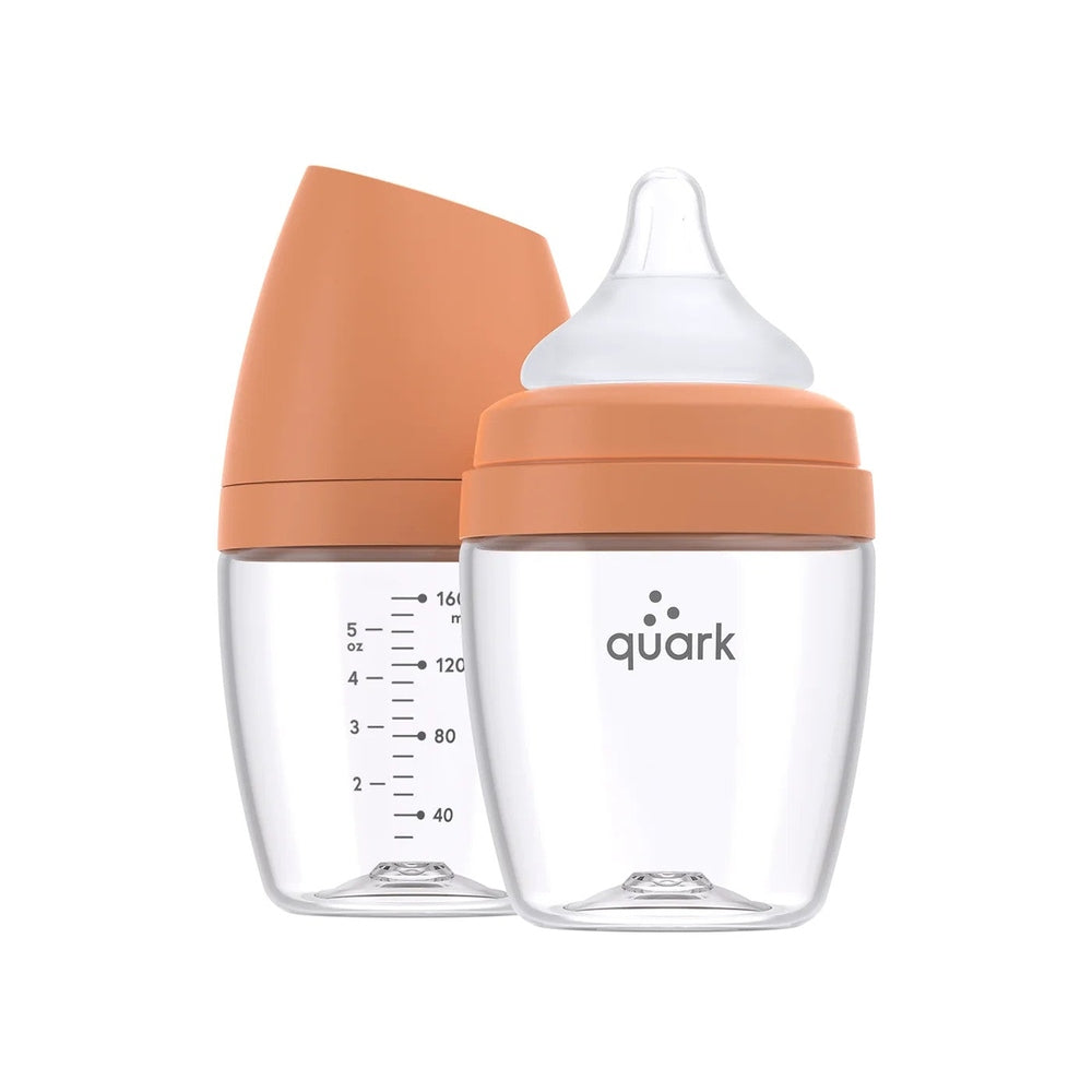 Quark Buubibottle Mini Hybrid Feeding Bottle 1 Pack; two clear bottles with peach caps and attached nipples.