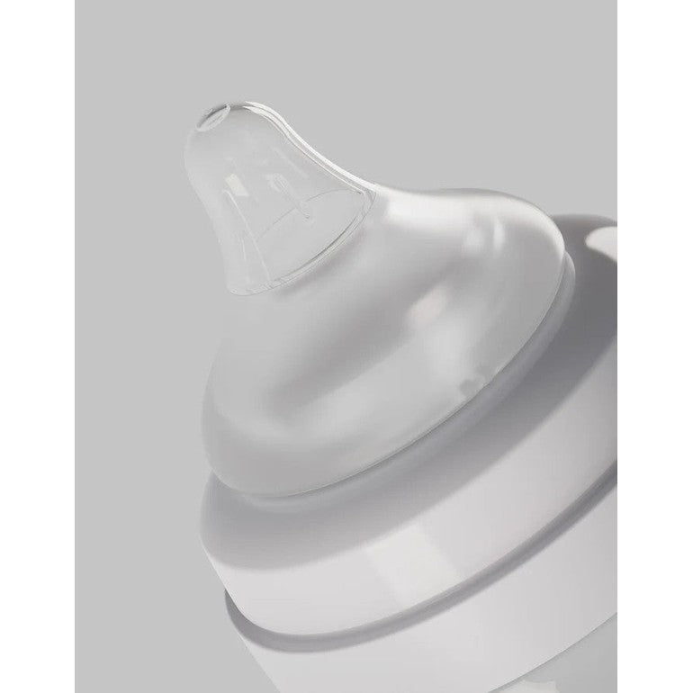 Quark Buubibottle Realfeel Bottle Nipples in clear silicone, shown atop a baby bottle for gentle feeding
