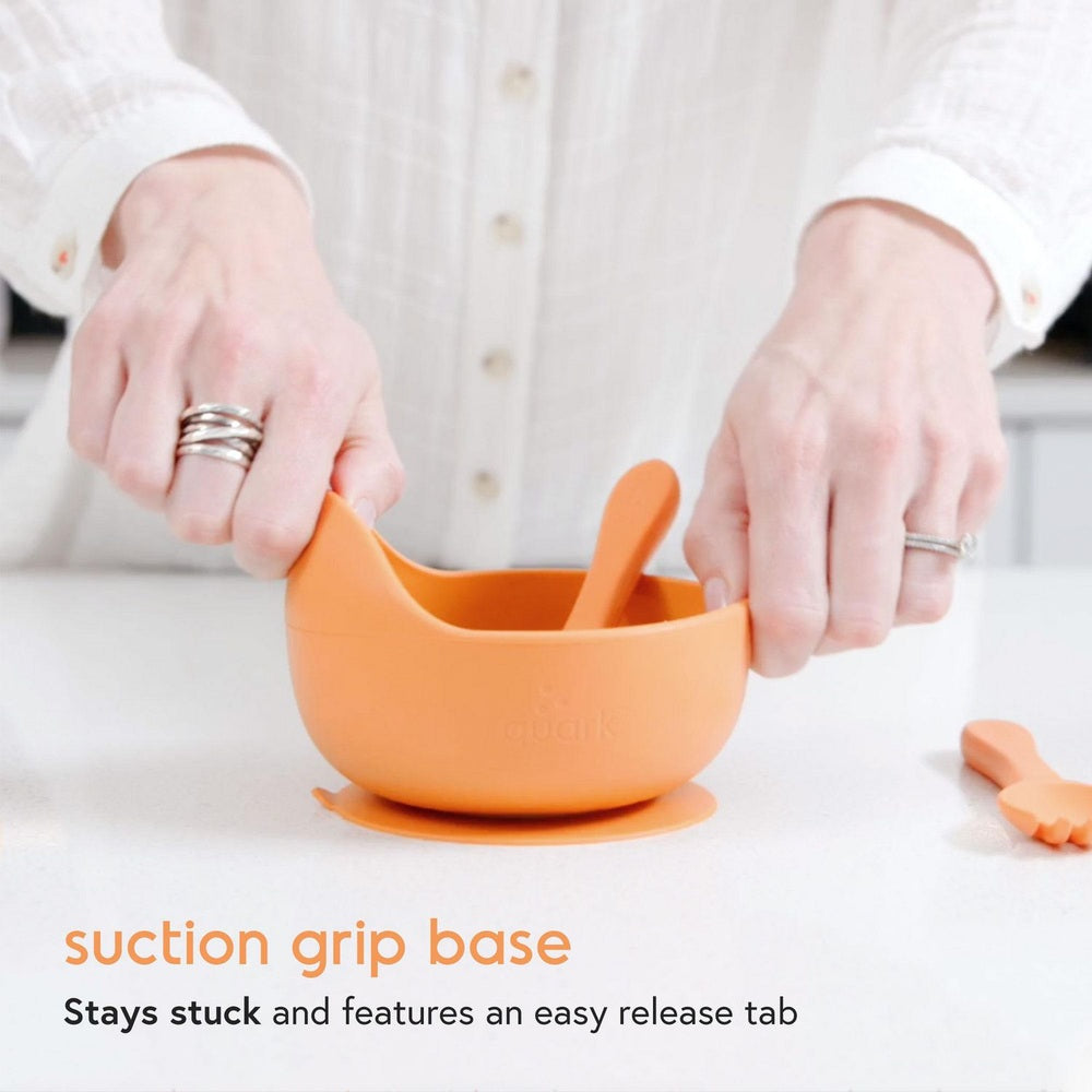 Quark Feedi silicone 5-piece feeding set with orange suction bowl and spoon, ideal for mealtime

