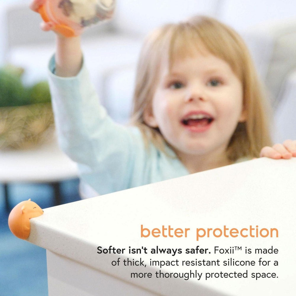 Quark Foxii silicone corner guards with orange fox head for babyproofing furniture corners.
