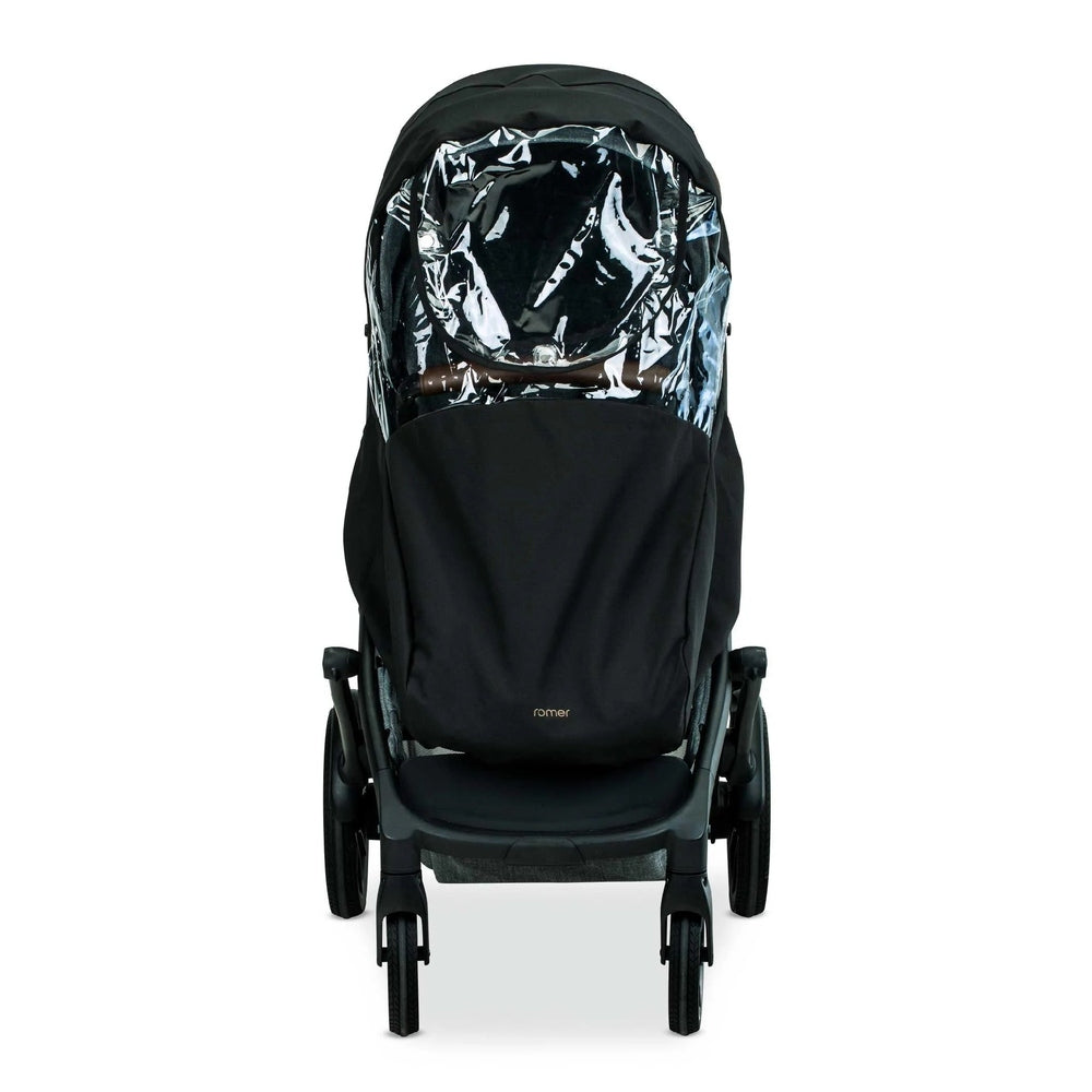 Romer Tura Rain Cover on a black stroller, clear plastic canopy shield with ROMER logo visible.