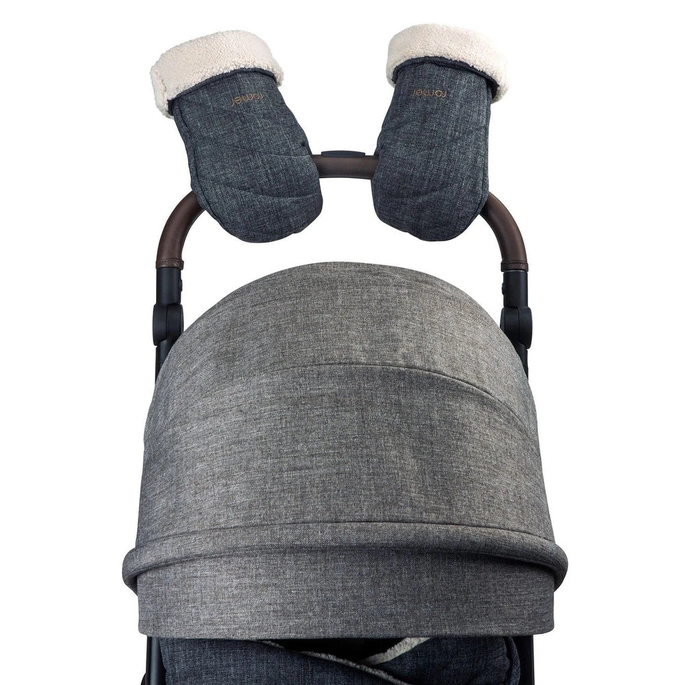 ROMER Romer Tura Winter Kit with cover and denim gloves on a stroller handle, cozy fleece cuffs.