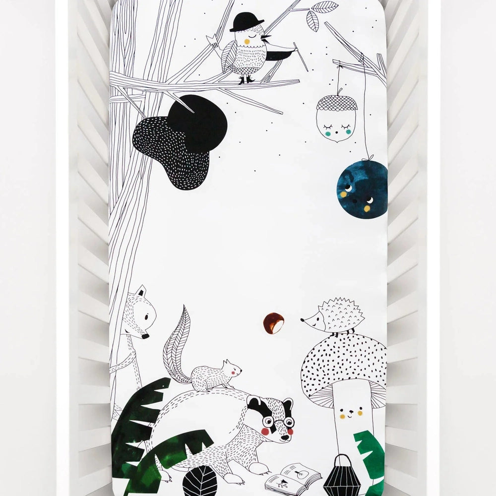 Rookie Humans crib sheet cotton sateen white with woodland animals and trees illustration