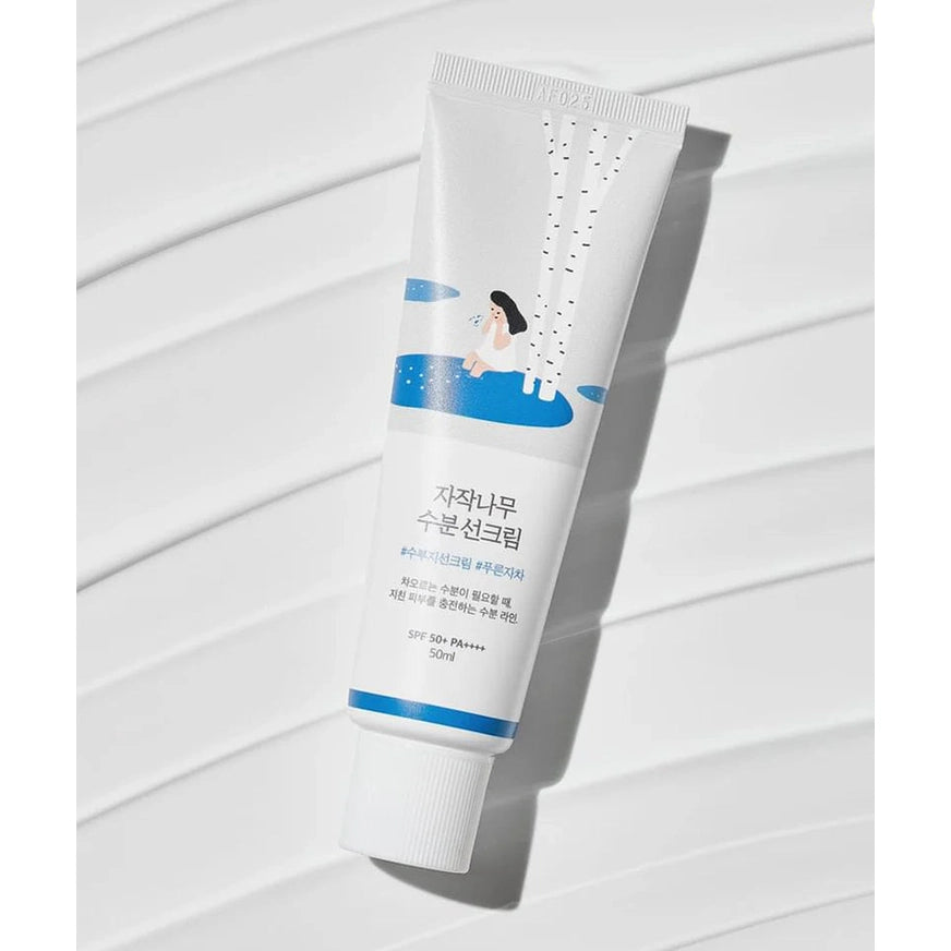 Round Lab Birch Moisturizing Sunscreen SPF50, 50 ml tube with blue birch illustration