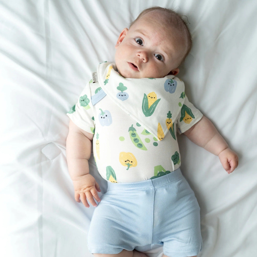 Silkberry Baby organic cotton bandana bib, Farmers Market print on white, worn by baby