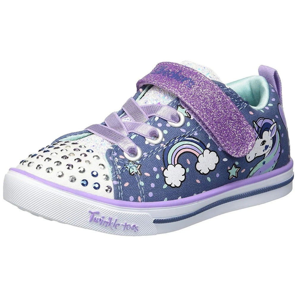 Skechers Twinkle Toes Unicorn Craze sneaker in denim/lavender, glitter strap fastened across top showing unicorn design.