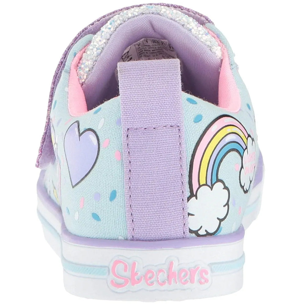 Skechers Twinkle Toes Unicorn Craze sneakers in light blue with rainbow and cloud designs, back view showing heel pull tab.