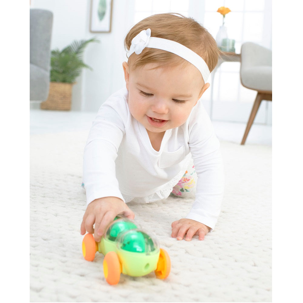 Skip Hop Farmstand Pod Squad Car toy for babies, green body with orange wheels.