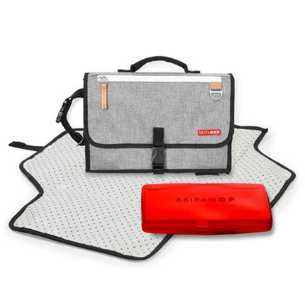 Skip Hop Pronto Signature Changing Station grey melange with matching changing mat and red zip pouch