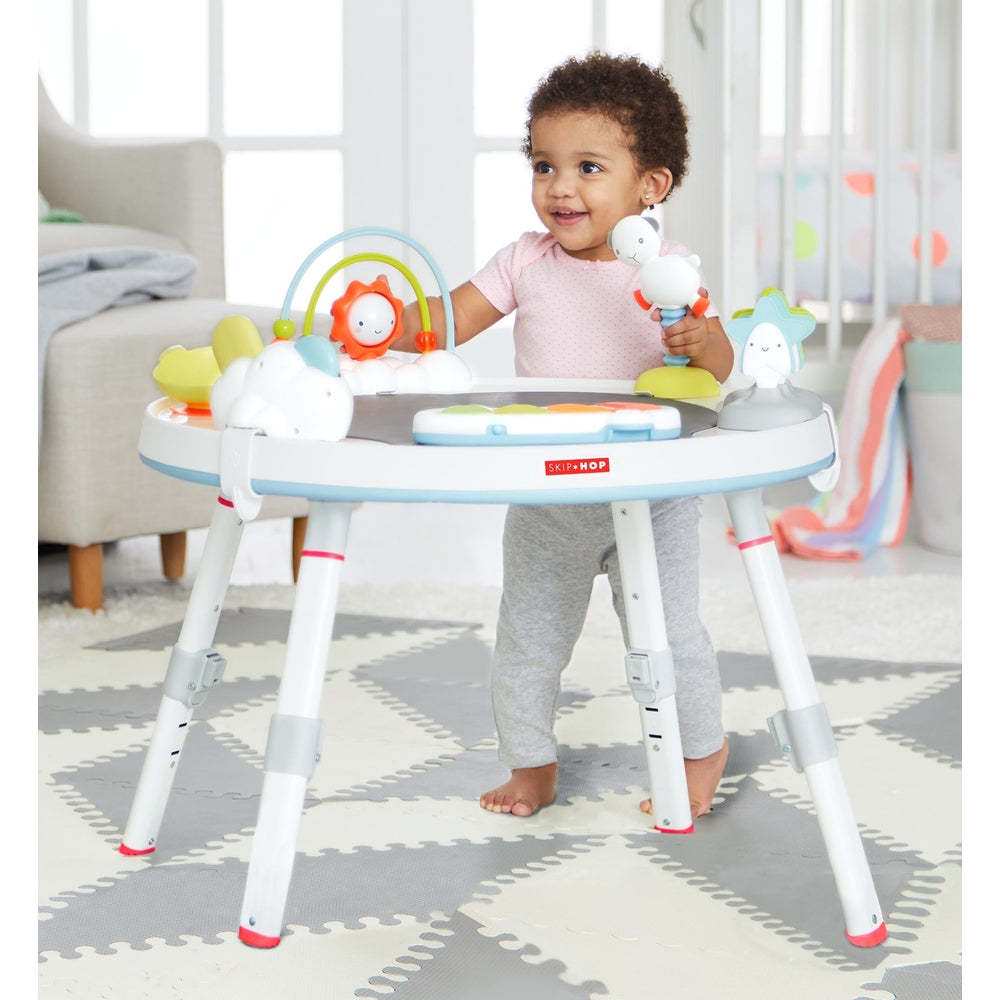 Skip Hop Silver Lining Cloud Baby's View Activity Center with bright arches and assorted toys