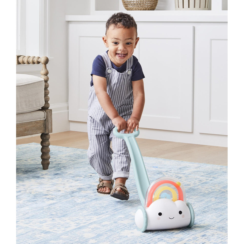 Skip Hop Silver Lining Cloud Rainbow push toy for toddlers with pastel blue handle and rainbow cloud