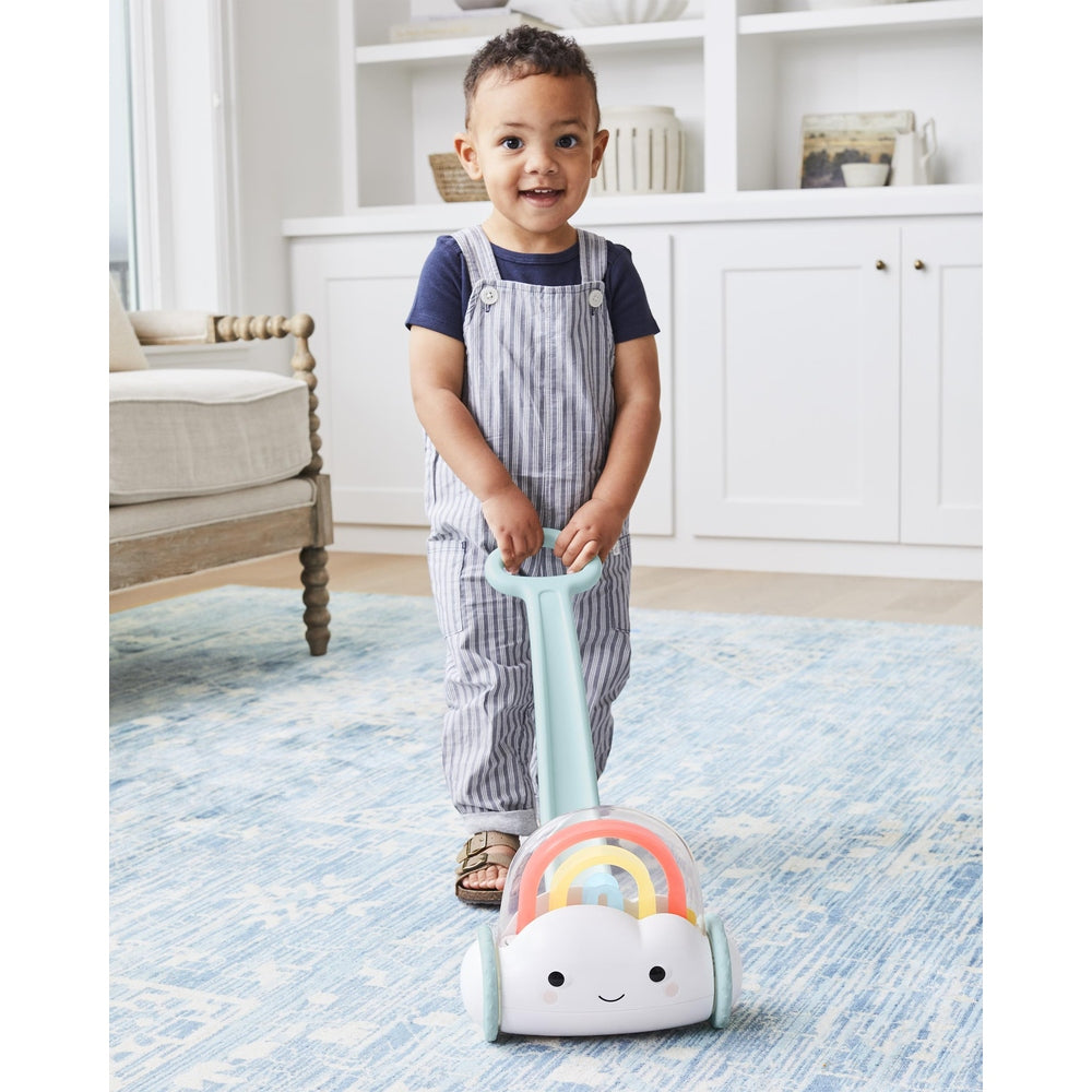 Skip Hop Silver Lining Cloud Rainbow Push Toy; pastel rainbow on a smiling cloud with wheels