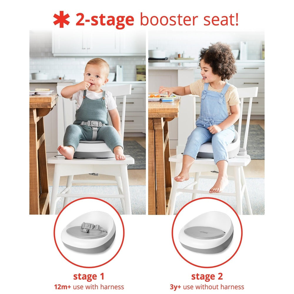 Skip Hop Sleek Seat Booster gray/white, two-stage toddler feeding seat with harness option (stage 1) and harness-free (stage 2).