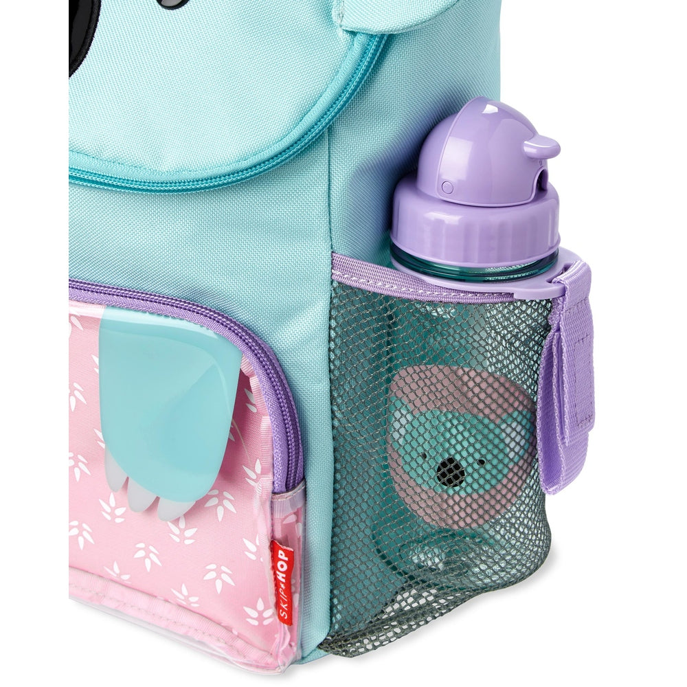 Skip Hop Zoo Koala big kid backpack in teal with pink floral front pocket and purple mesh water bottle holder.