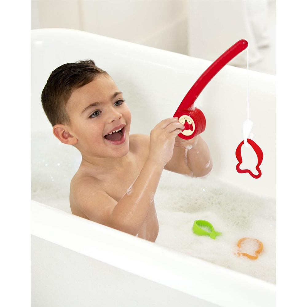 Skip Hop Zoo Fishin' Fox bath toy, red fishing rod with fox emblem and colorful foam fish in bubbles