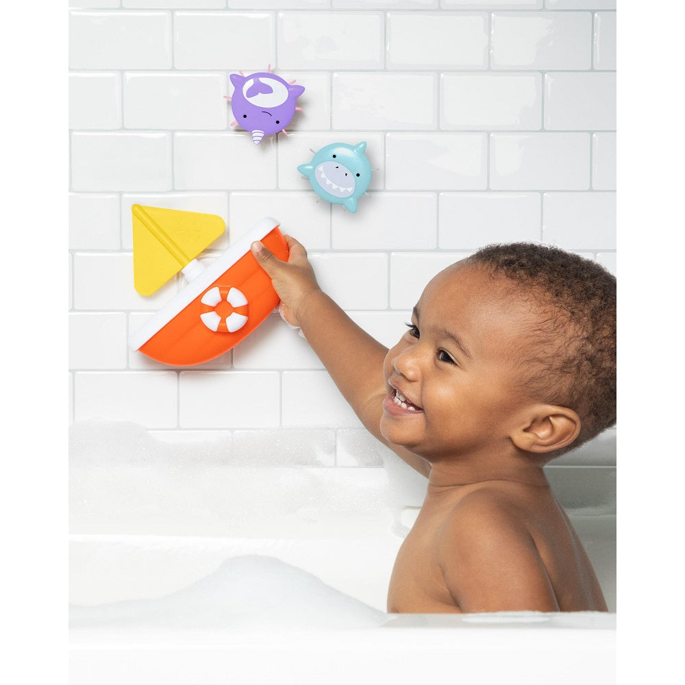 Skip Hop Zoo Tip & Spin Boat bath toy, orange boat with yellow sail