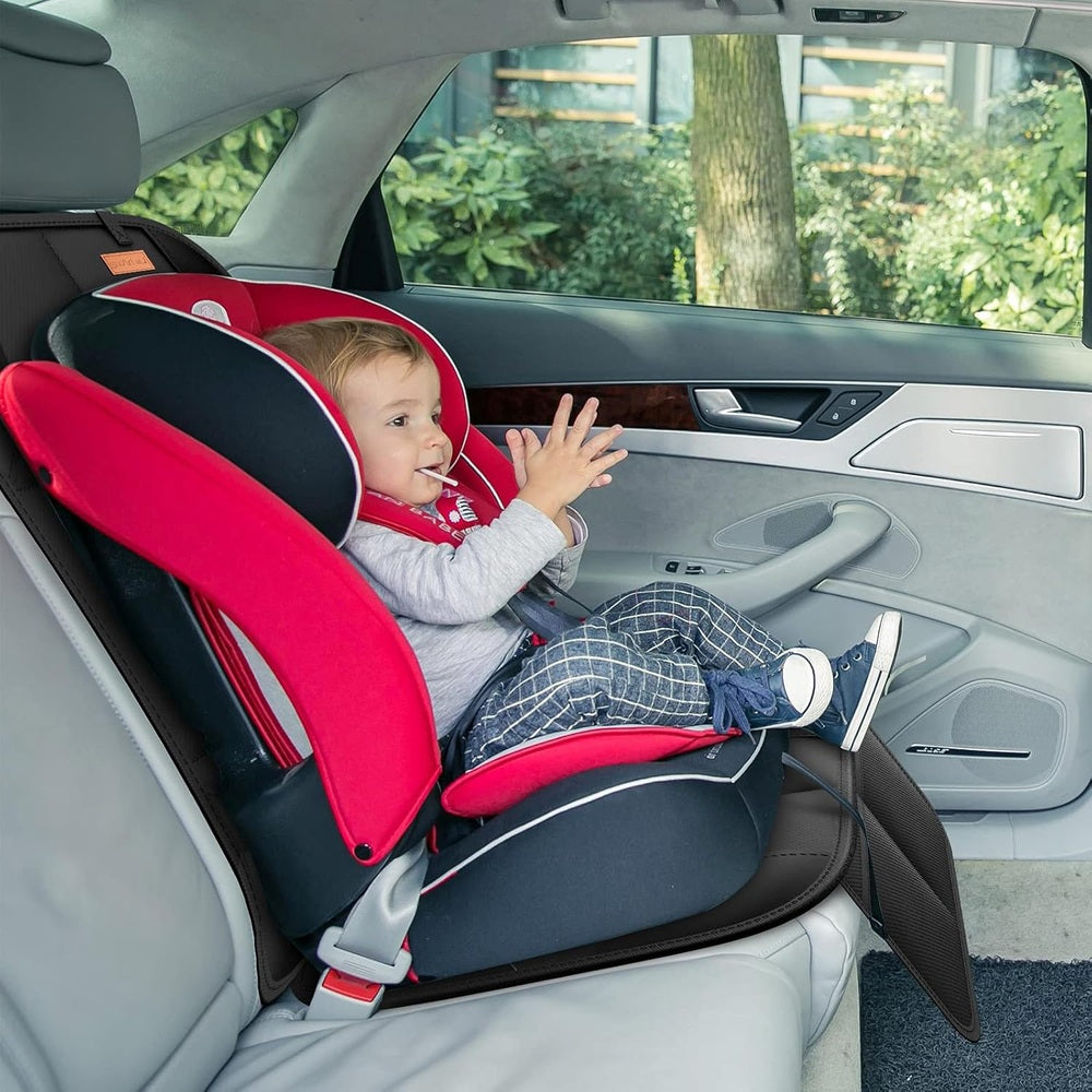 Baby EnRoute Smart Elf Car Seat Protector 2-Pack in red and black with a baby in a car seat.