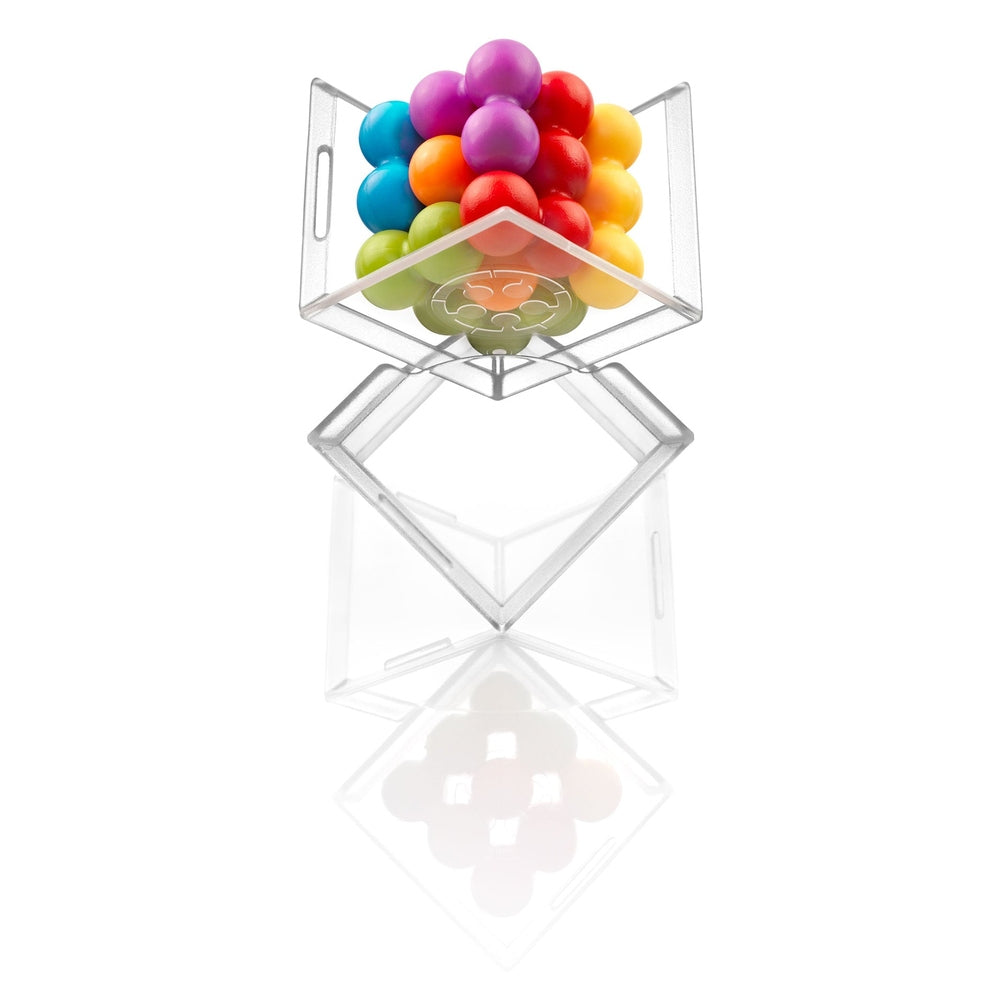Smart Games Cube Puzzler Pro puzzle toy with a clear cube and rainbow-colored balls