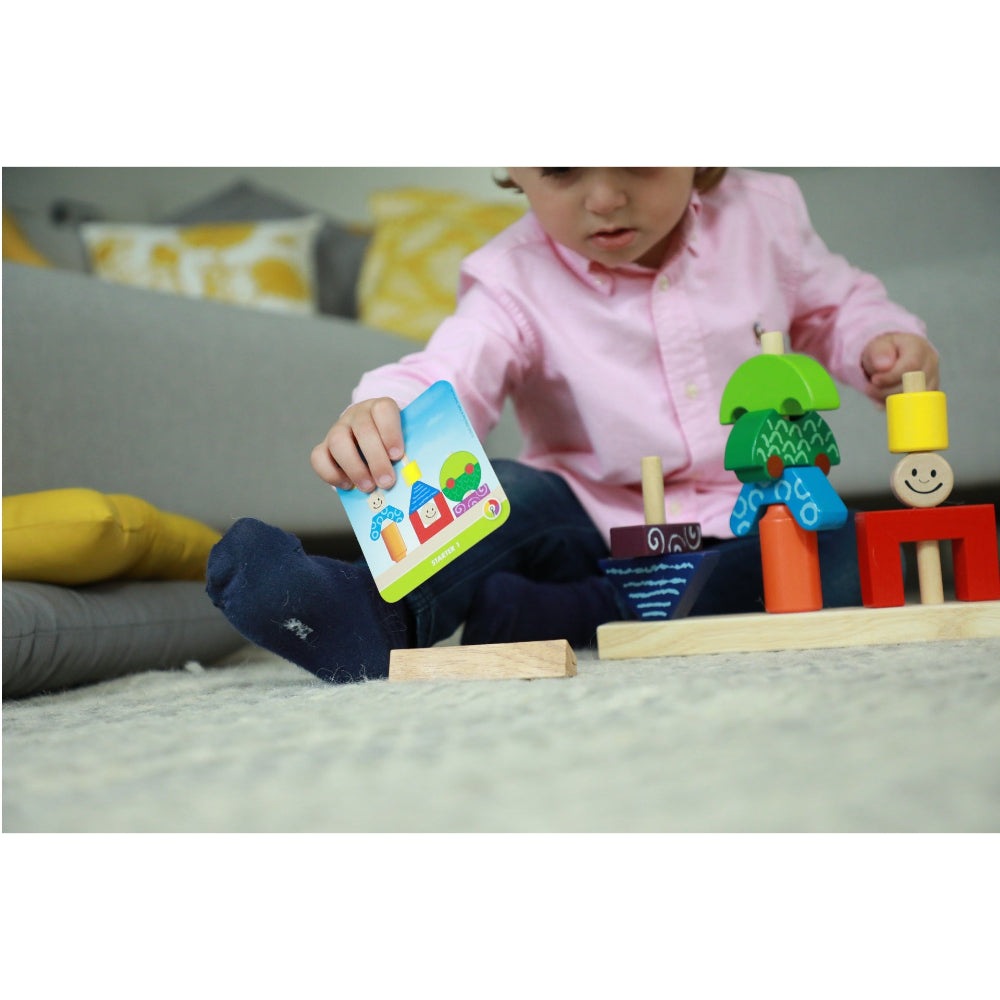 Smart Games Day & Night wooden block toy set with colorful pieces and card, child playing.