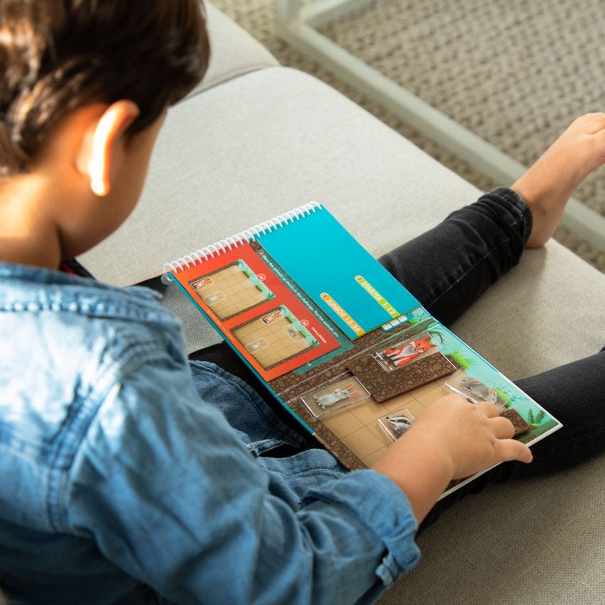 Smart Games Down The Rabbit Hole educational puzzle book for kids, colorful grid cards and rabbit theme