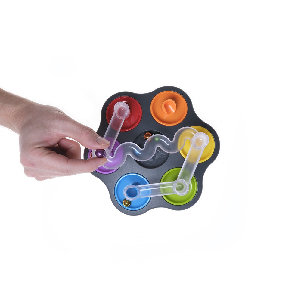Smart Games Dropzone puzzle toy by SMART GAMES featuring colorful pegs and clear movable arms.