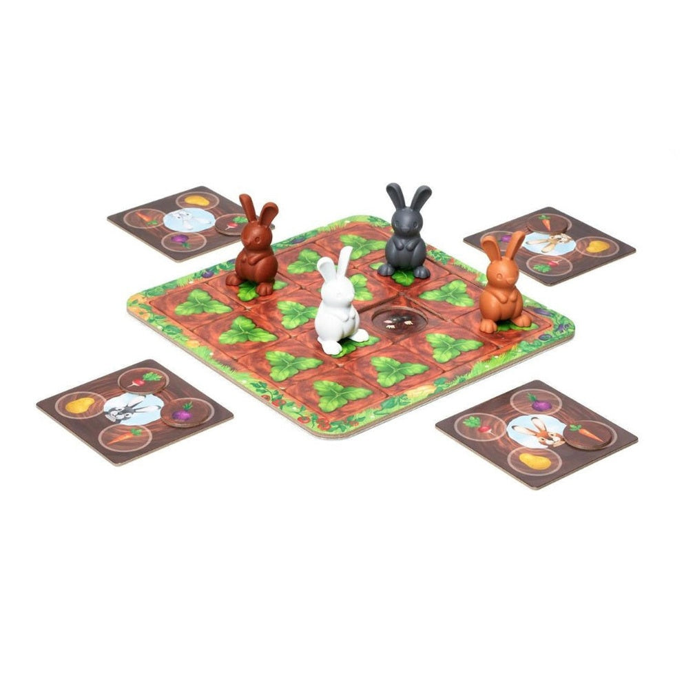 Smart Games Grabbit puzzle with four bunny figurines on a leafy grid board and five challenge cards