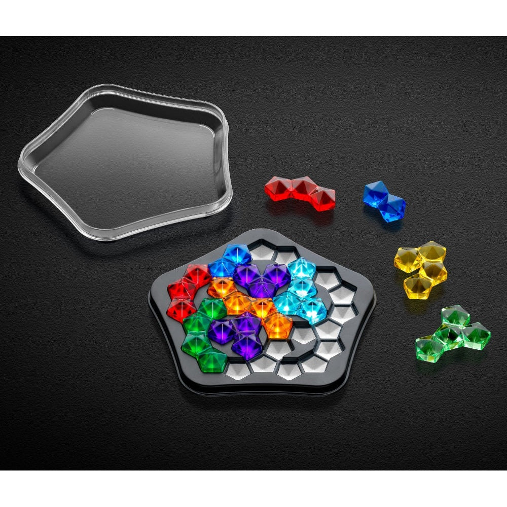 Smart Games IQ Deluxe Pentagon educational puzzle with colorful gem pieces on a hexagonal tray