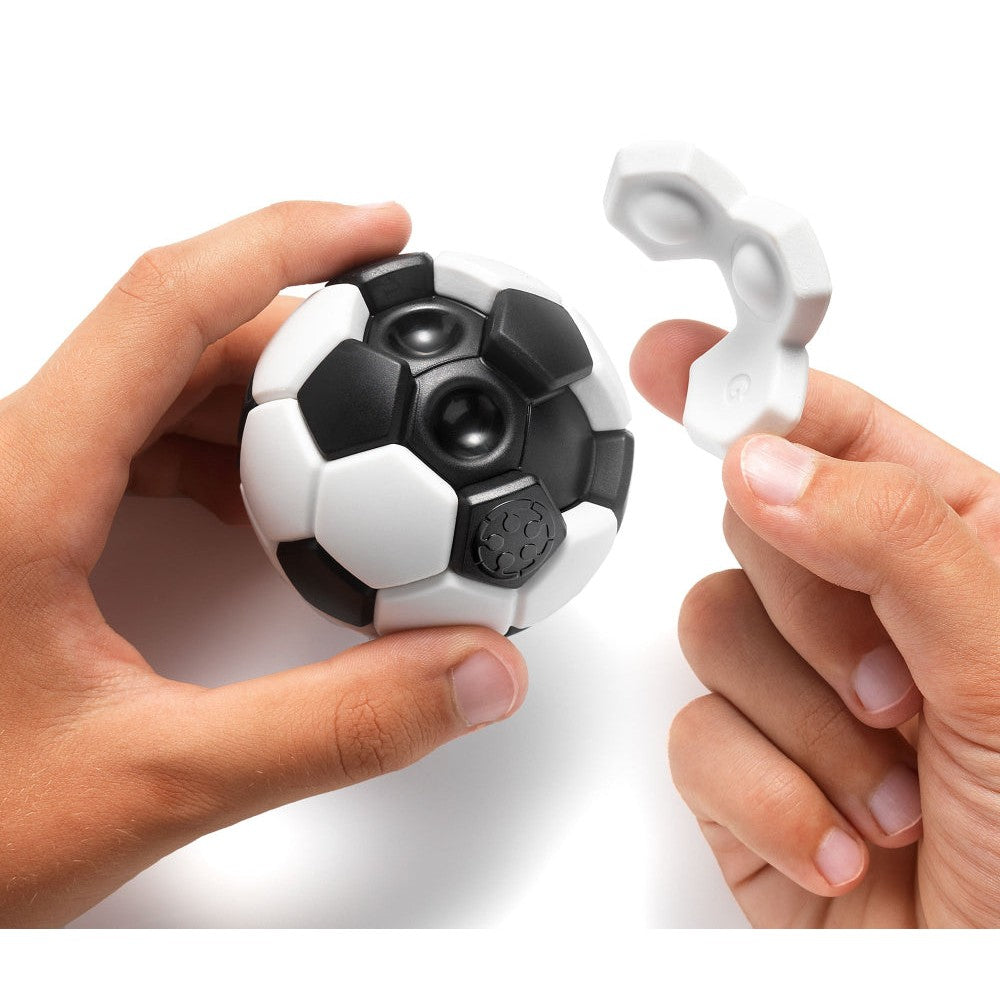 Smart Games Plug & Play Ball puzzle toy, black and white soccer-style ball with a white clip