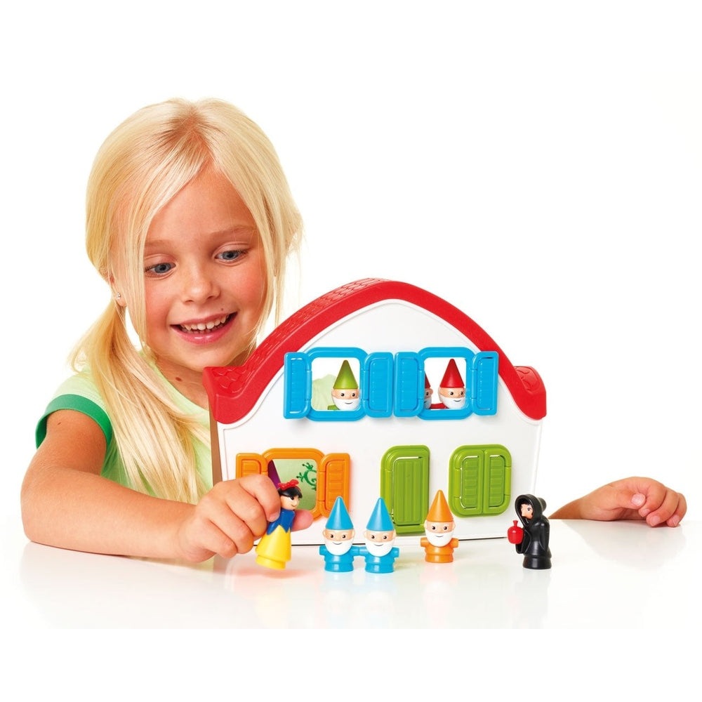 Smart Games Snow White Deluxe educational toy set with five colorful dwarf figurines and a white house board